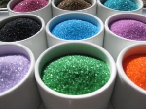 nine bowls of different flavored cotton candy sugar