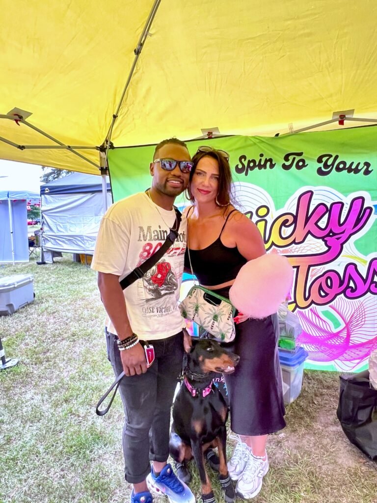 Man and woman eating cotton candy